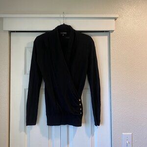 The Limited Medium black sweater with gold accent buttons on the side